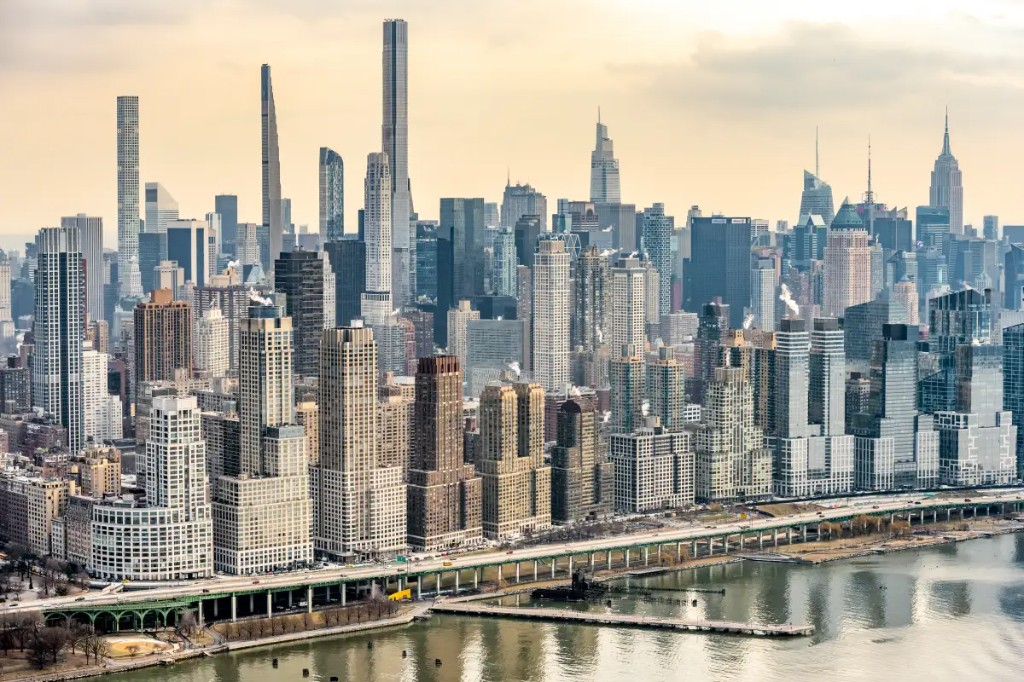 Dense Manhattan skyline with Empire State Building and East River