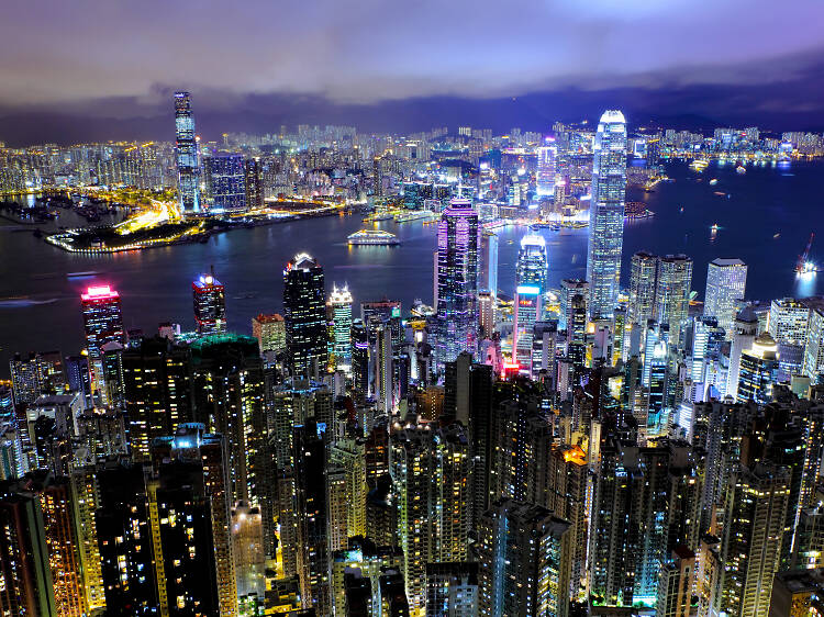 Hong Kong skyline at night with Victoria Harbour and illuminated towers