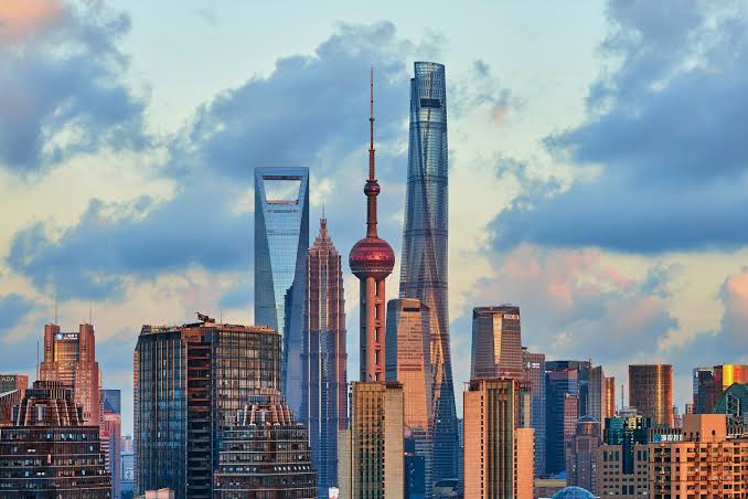 Shanghai Pudong skyline at golden hour with Oriental Pearl Tower